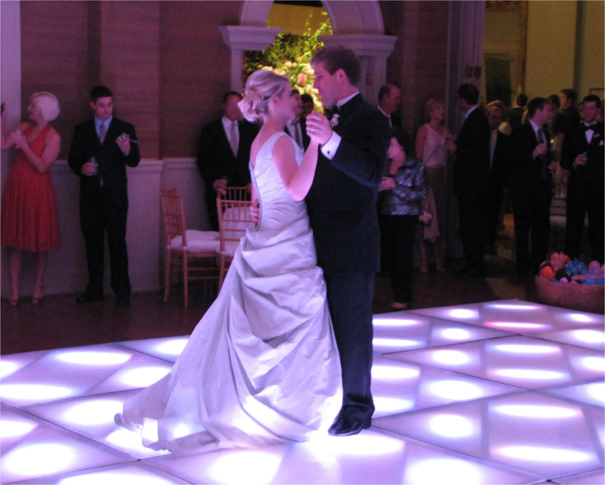 Large, square, lighted dance floor in white with bride and father dancing.